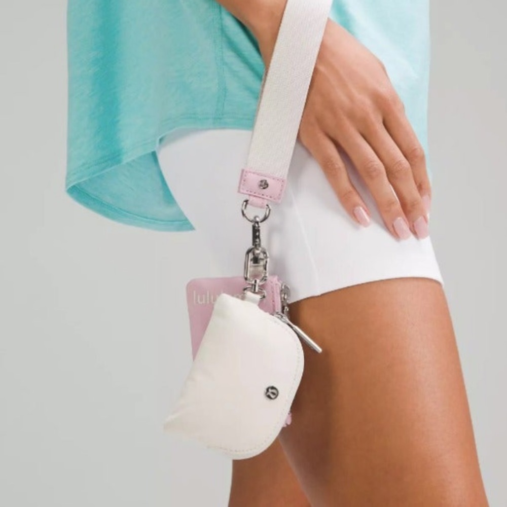 NWT dual wristlet pouch in pink peony and white lululemon